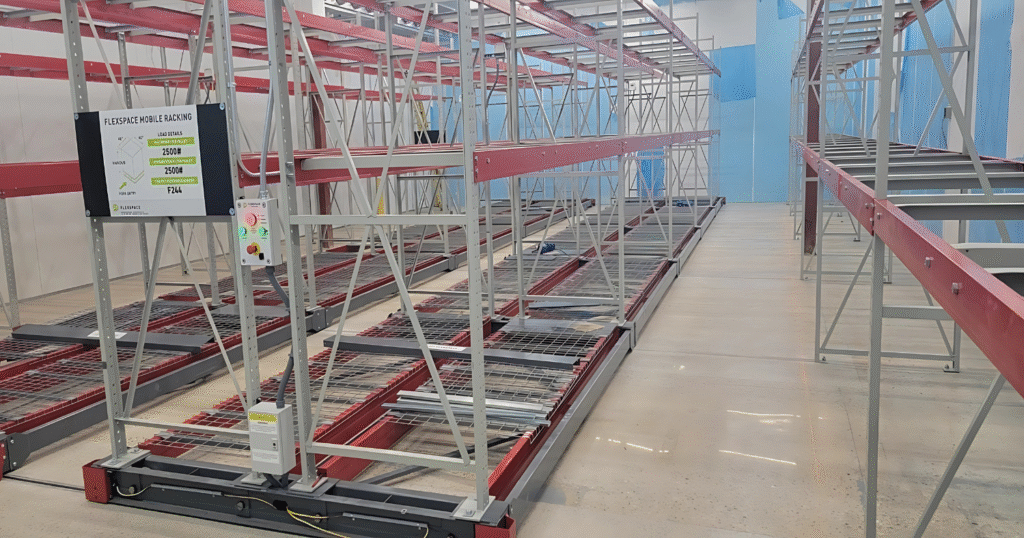 Image of FLEXSPACE mobile racking in former office space to provide a visual of copy above.
